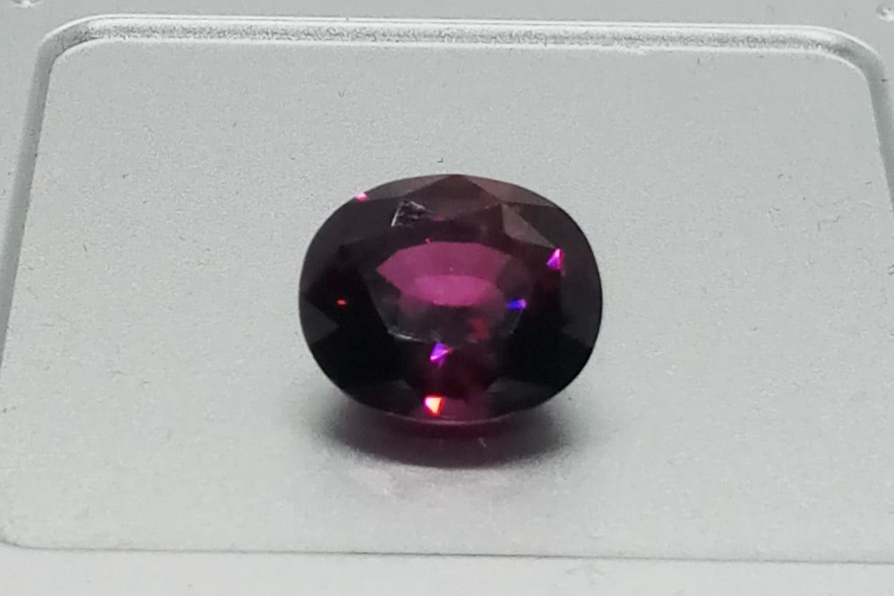 Swiss Lab Certified 8.07ct Red-Purple Oval Natural Rhodolite Gemstone