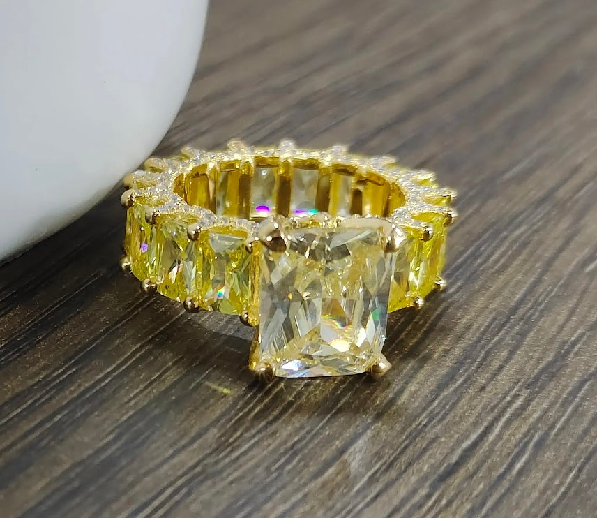 Striking 12-Carat Yellow Sapphire Eternity Band