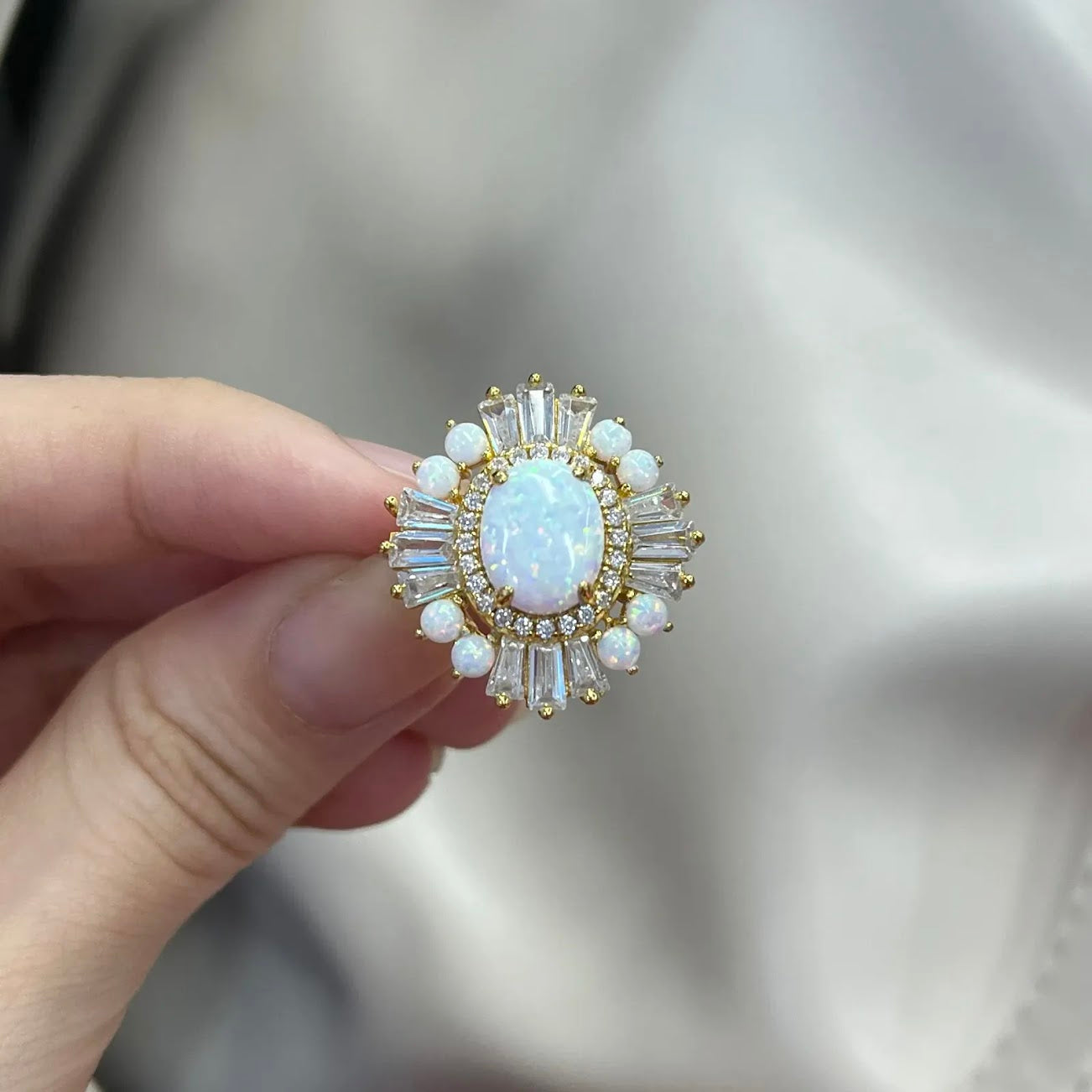 Luminous 5ct Oval Opal Engagement Ring with Dazzling White Sapphire & Opal Halo