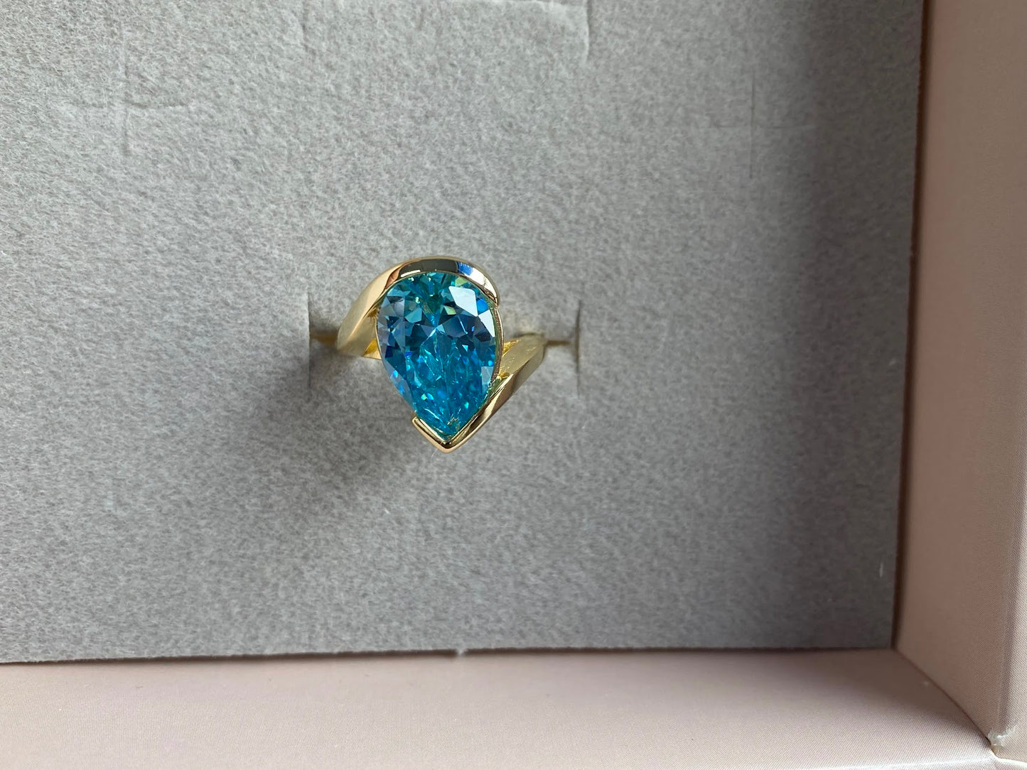 Captivating 5ct Pear Cut Aquamarine Ring with Flowing Bypass Setting