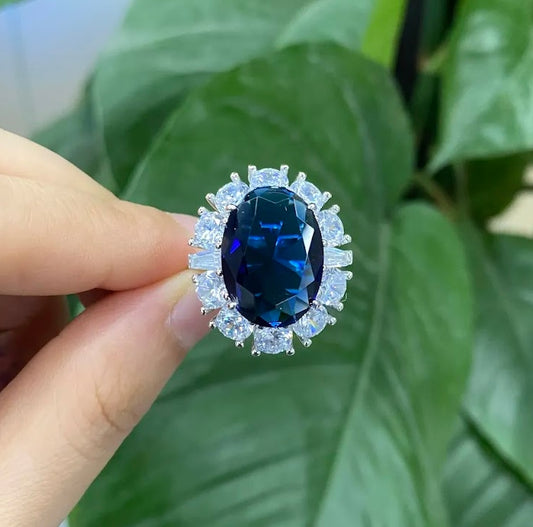 Classic 7ct Oval Blue Sapphire Halo Ring
