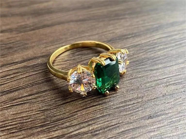 4ct Emerald-Cut Green Sapphire Three-Stone Ring