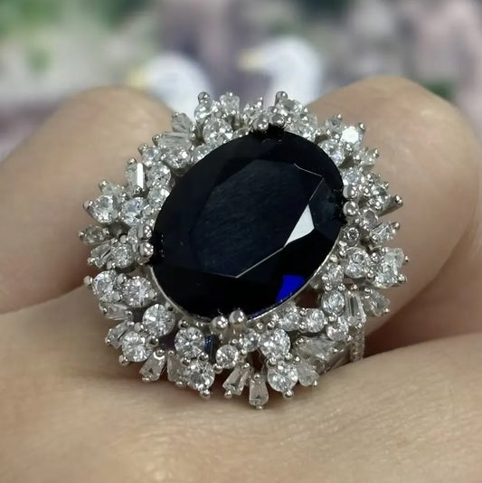 Classic Romance: A Rich 6.75ct Oval Blue Sapphire