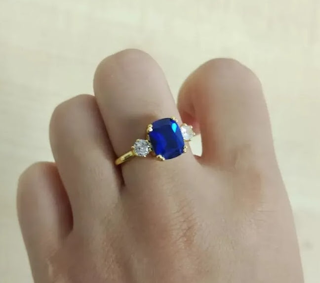 4ct Cushion-Cut Blue Sapphire Three-Stone Engagement Ring