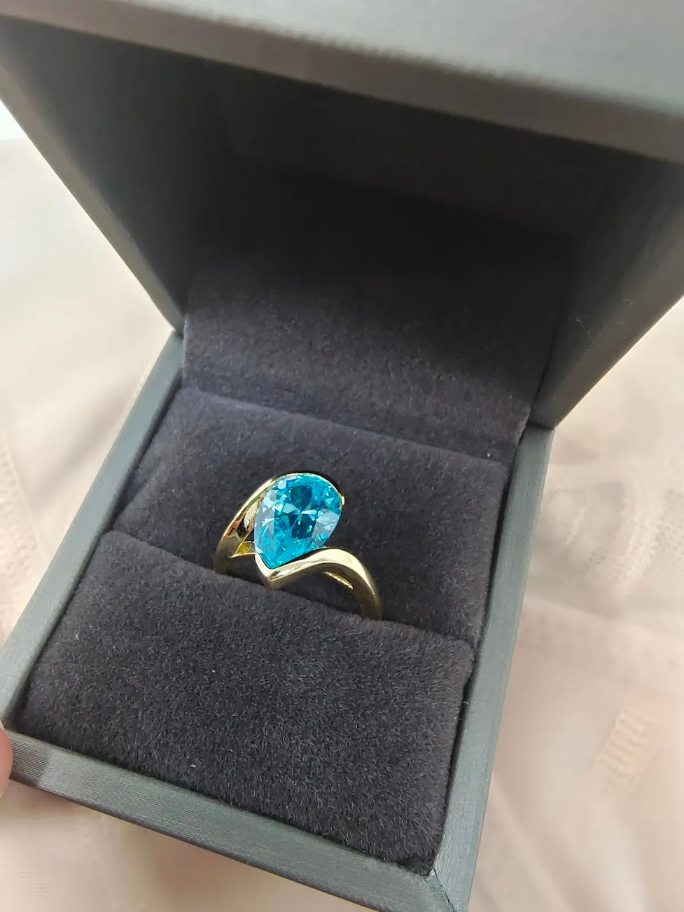 Captivating 5ct Pear Cut Aquamarine Ring with Flowing Bypass Setting