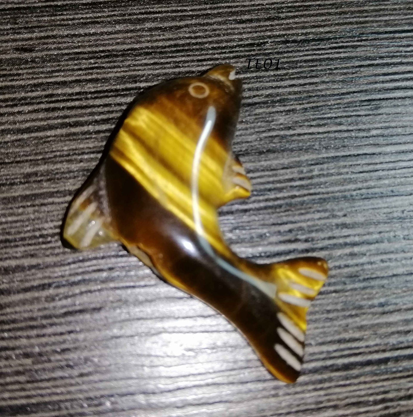 NATURAL CARVED TIGER EYE (dolphin)