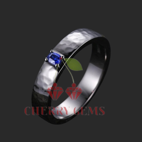 Stylized Hammered Band Ring with Blue Sapphire