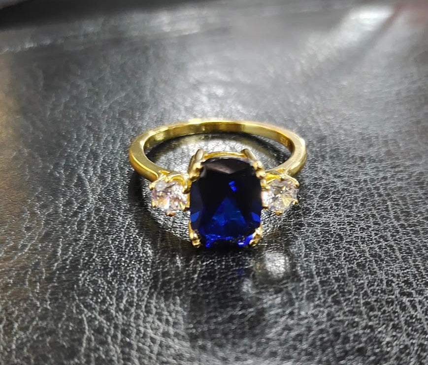 4ct Cushion-Cut Blue Sapphire Three-Stone Engagement Ring