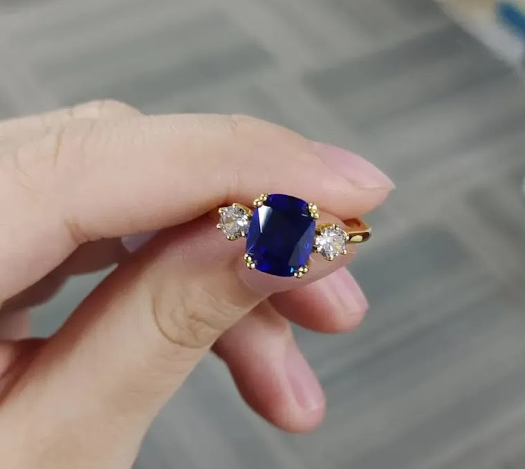 4ct Cushion-Cut Blue Sapphire Three-Stone Engagement Ring