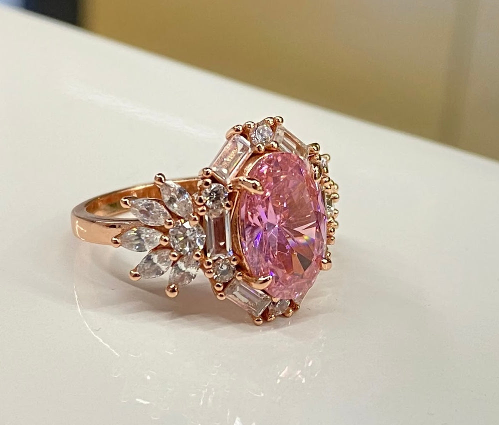 3-Carat Oval-Cut Pink Sapphire Engagement Ring with Halo in Rose Gold