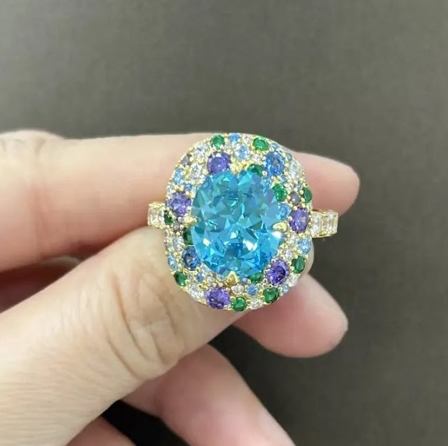 Vibrant 5-Carat Oval Aquamarine and Sapphire Cocktail Ring