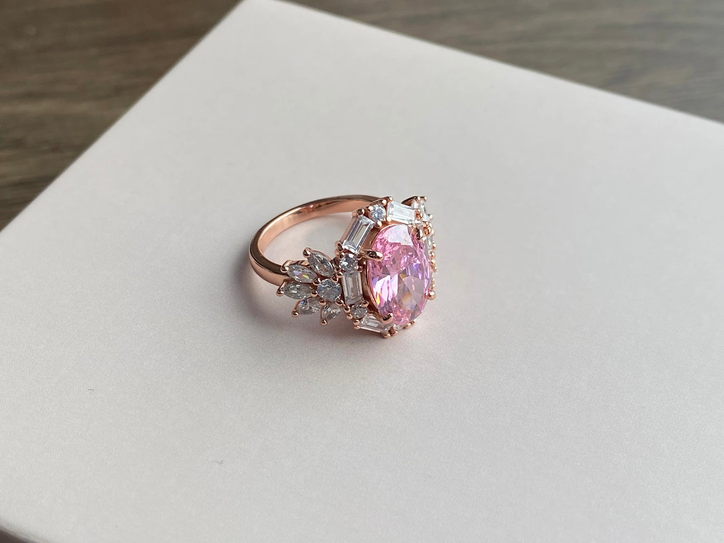 3-Carat Oval-Cut Pink Sapphire Engagement Ring with Halo in Rose Gold